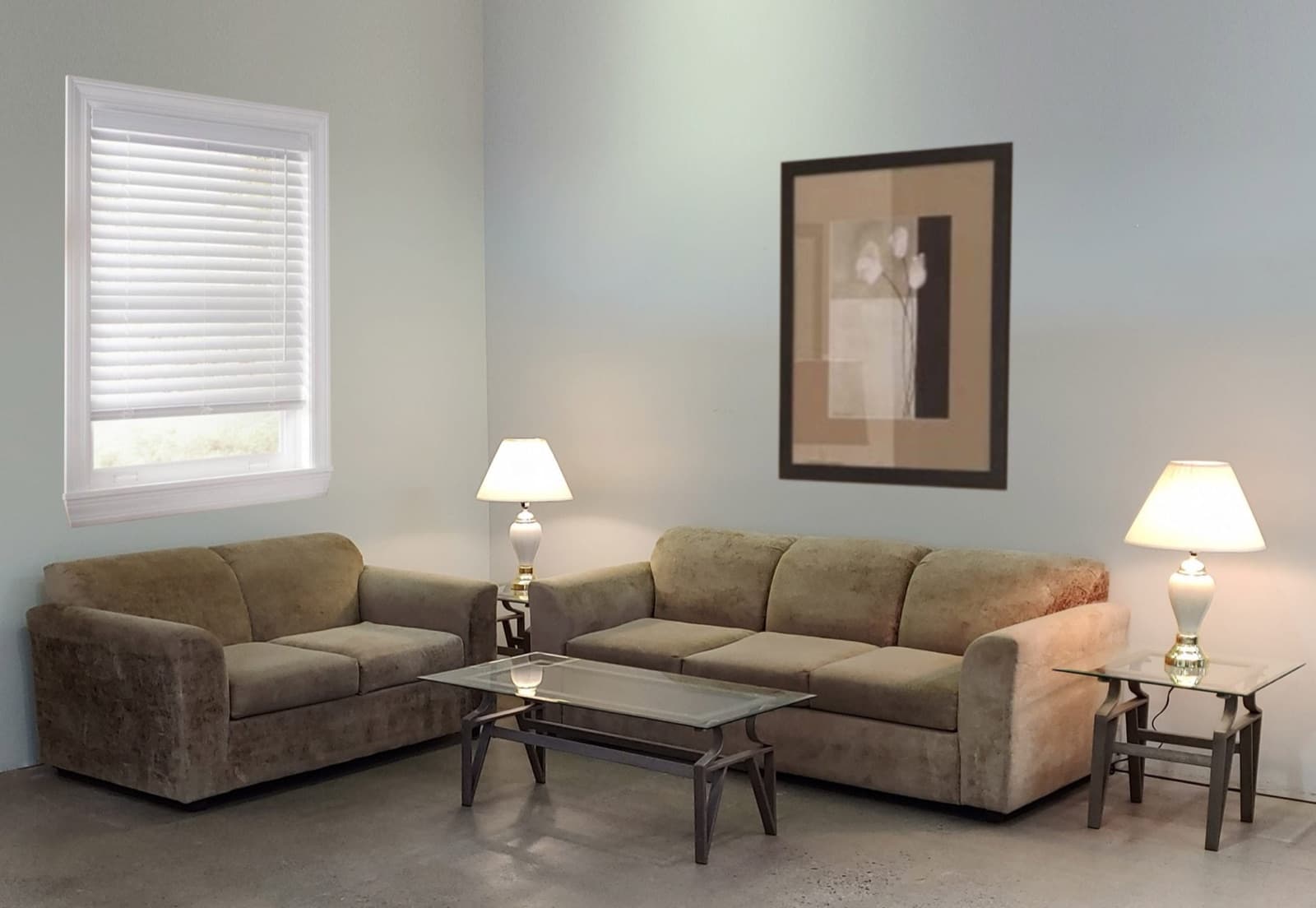 Student package living room — sofa, loveseat, coffee table, and lamps